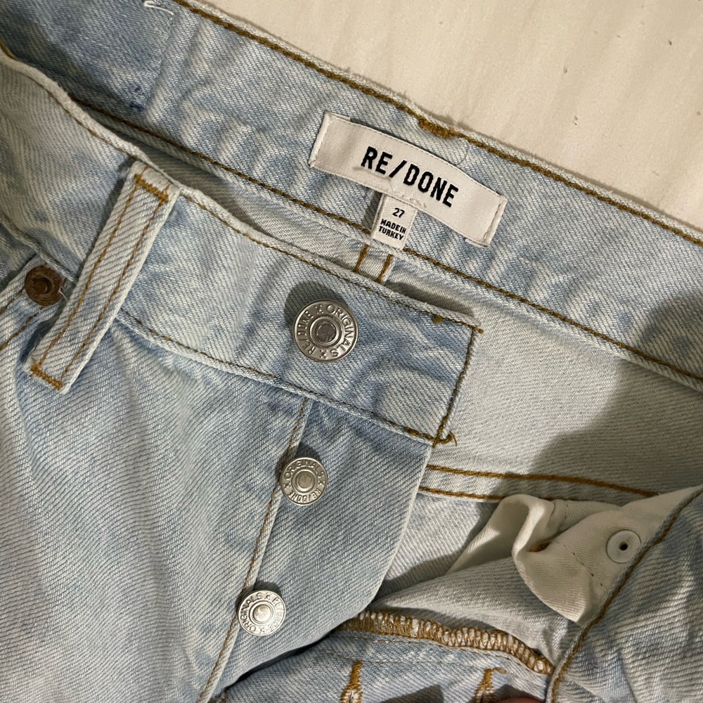 RE/DONE Originals 90s high rise, loose jeans in breezy indigo with rips